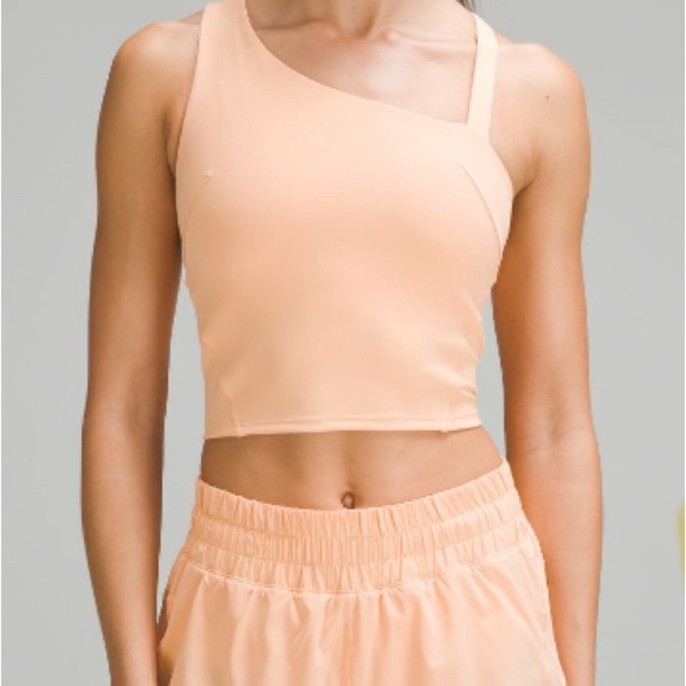 Lululemon Everlux Asymmetrical Tennis Tank Top. Size 6